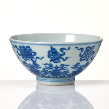 A Chinese blue and white cup with Qianlong seal mark.