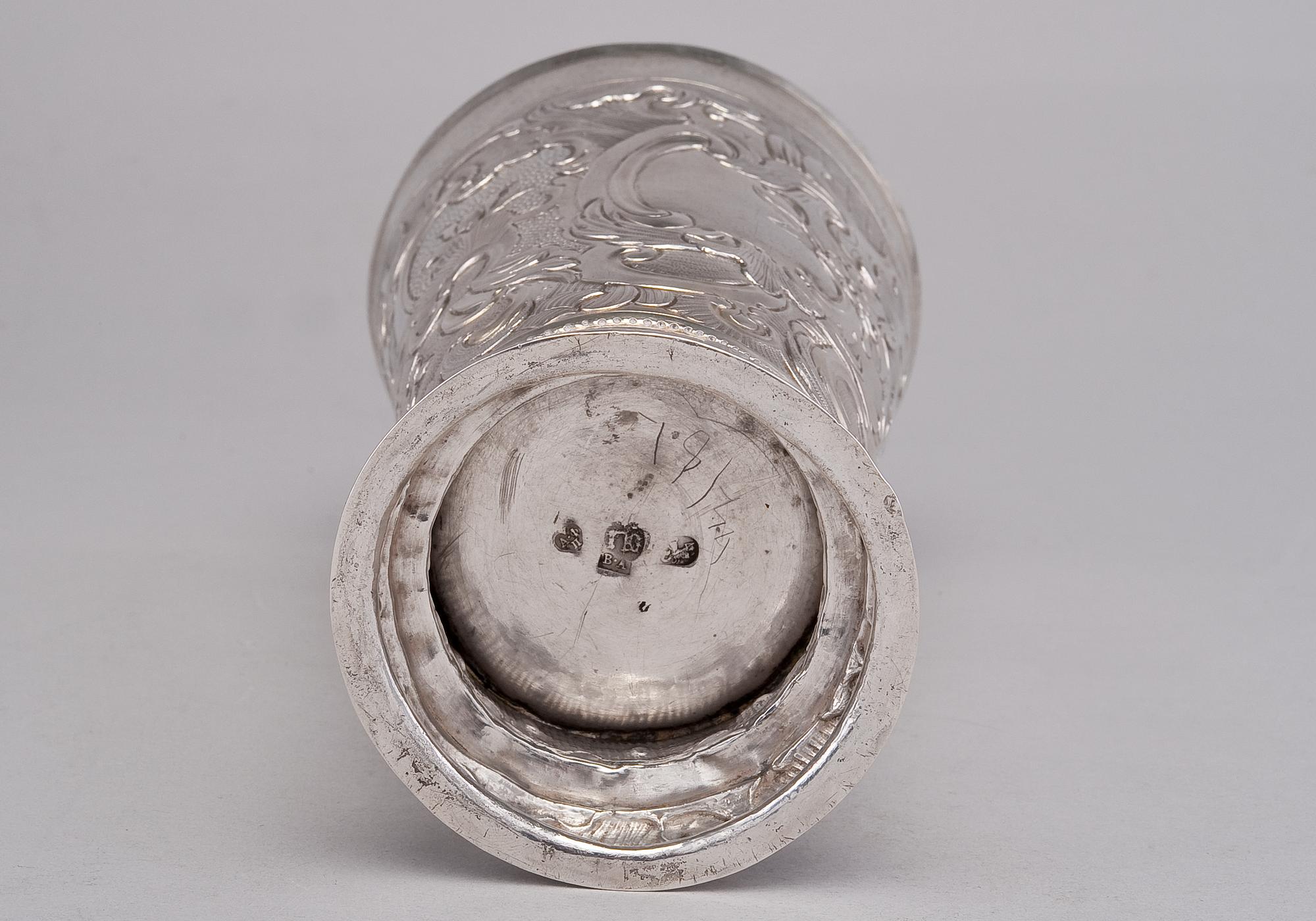 A BEAKER.