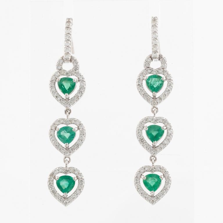 Emerald and brilliant cut diamond earrings.