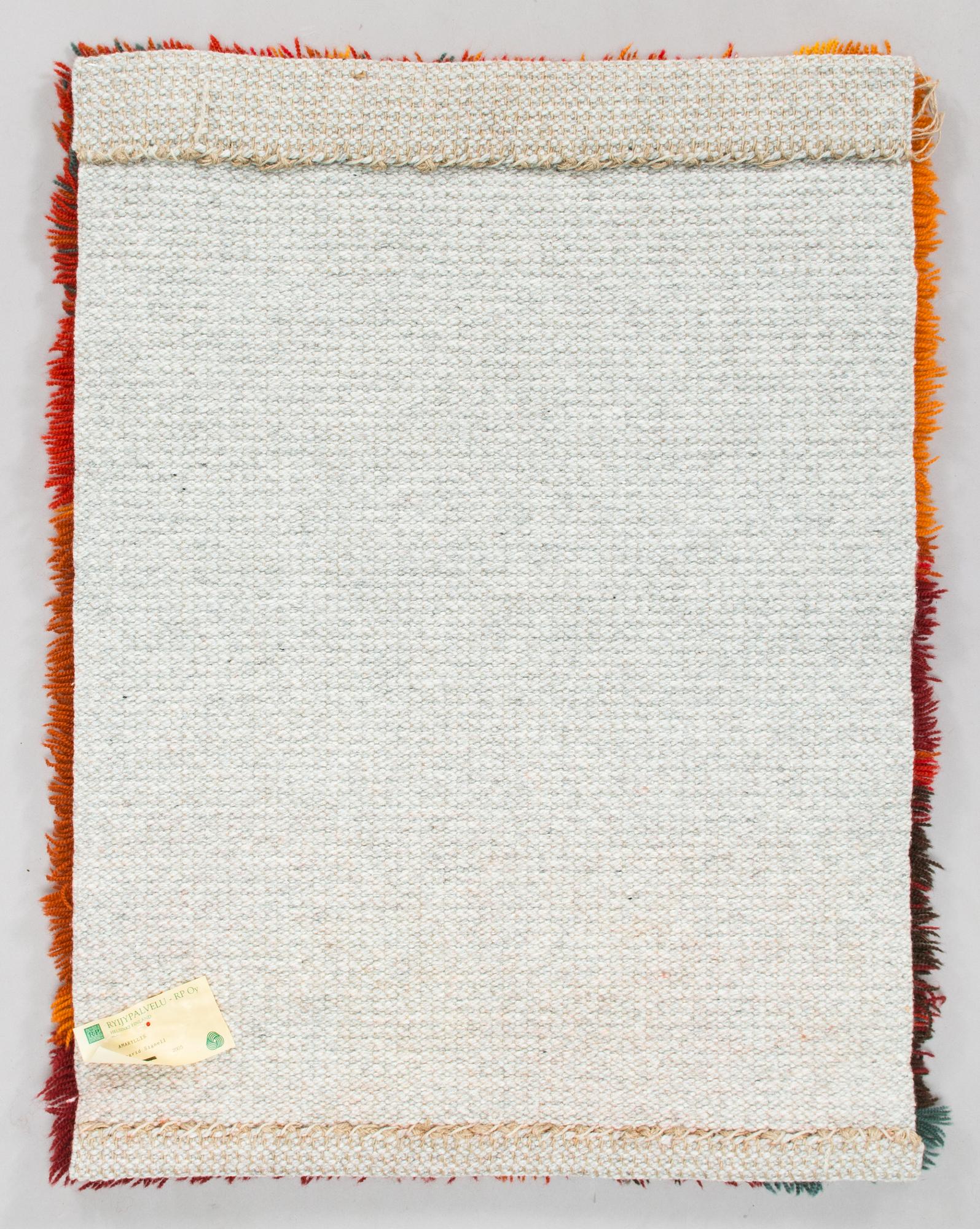 Ingrid Signell, a rya rug, "Amaryllis", Ryijypalvelu Oy. Ca. 83 x 63 cm.