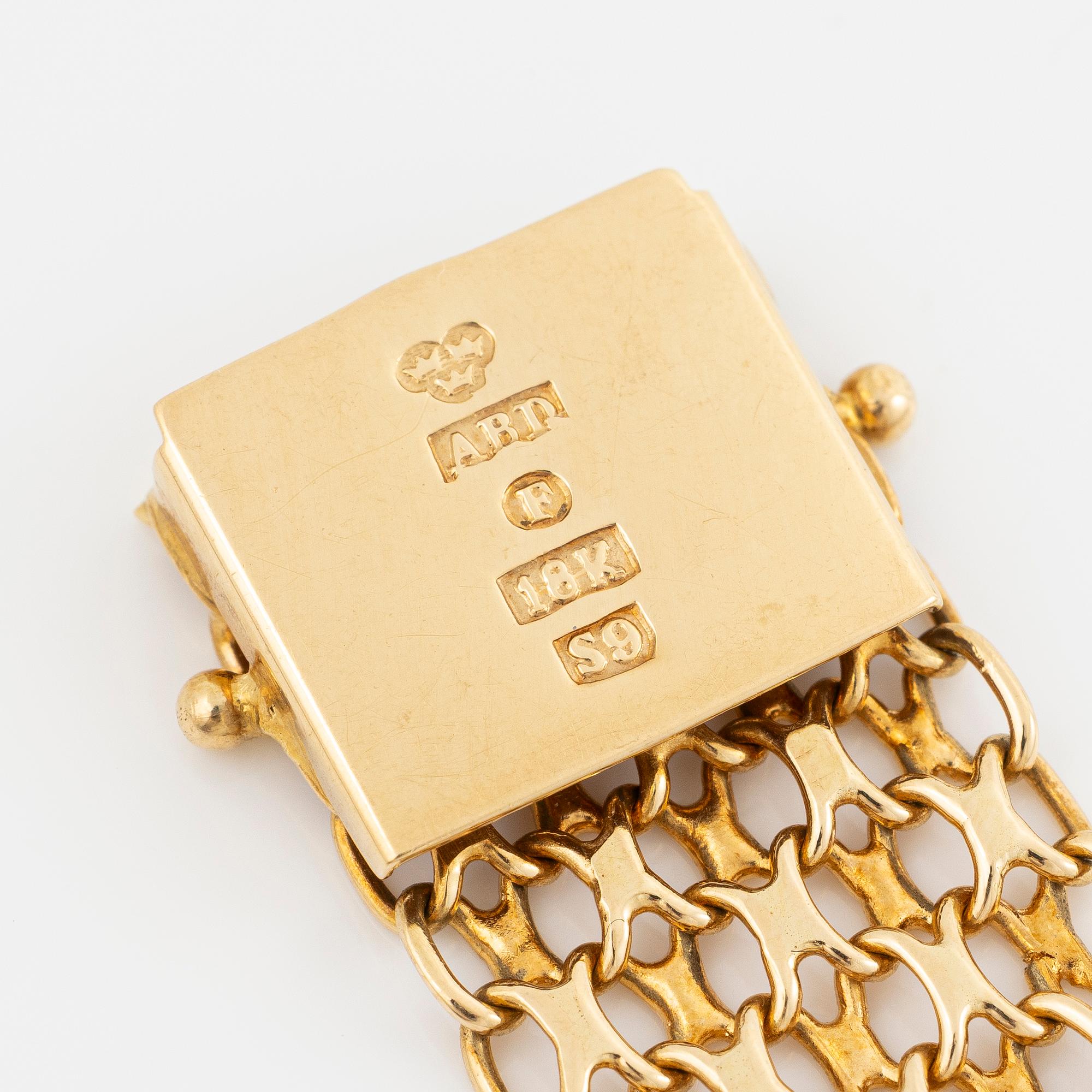 Rolex, 18K gold, with an 18K gold bracelet, wristwatch, 31.5 mm.