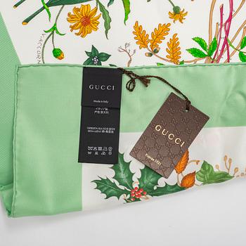 Gucci, a 'Flora' silk scarf.