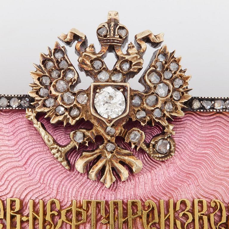 FABERGÉ, Nobelbrosch, guld, emalj och diamanter.