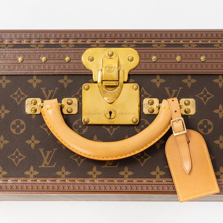Louis Vuitton, A 'Alzer 60' travel bag, 2002.