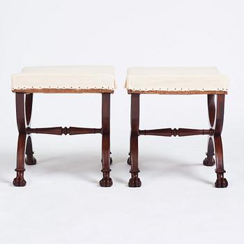 A pair of Directoire mahogany stools, circa 1800.