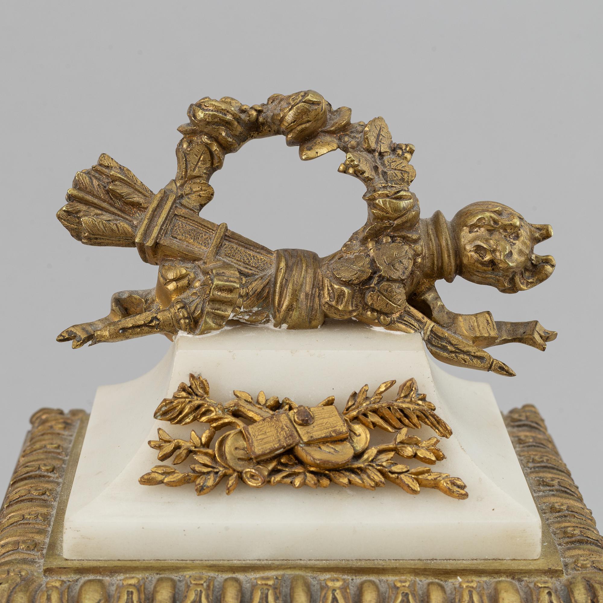A circa 1900 Louis XVI-style mantle clock.
