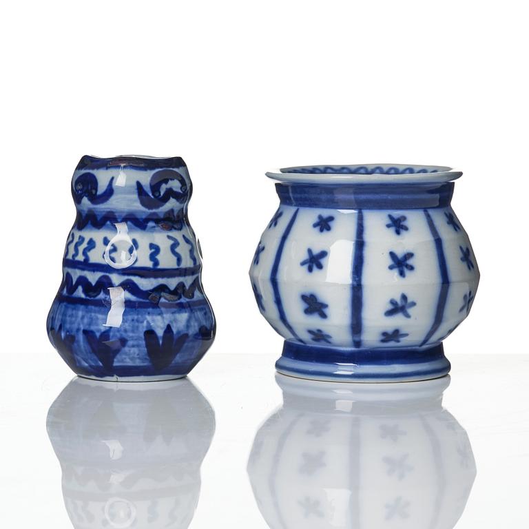 Wilhelm Kåge, a jar with cover, and four vases, creamware and porcelain, Gustavsberg, Sweden, 1917-1920.