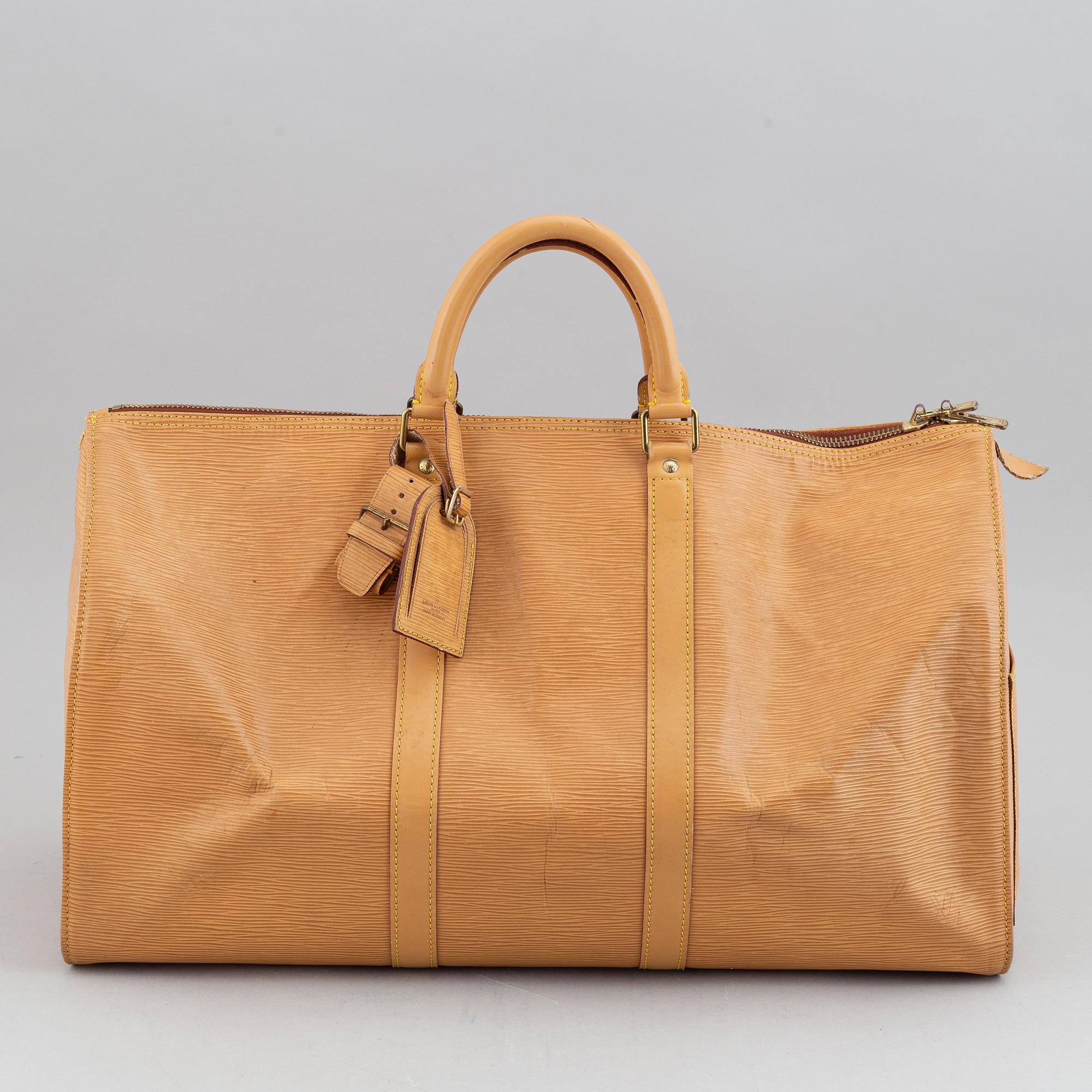 Louis Vuitton, am Epi 'Keepall 50' weekend bag.