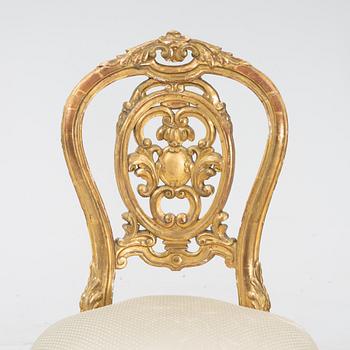 A pair of gesso and giltwood rococo-revival chairs, later part of the 19th Century.