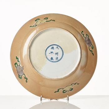 A famille verte dish, Qing dynasty, with a Xuande mark.