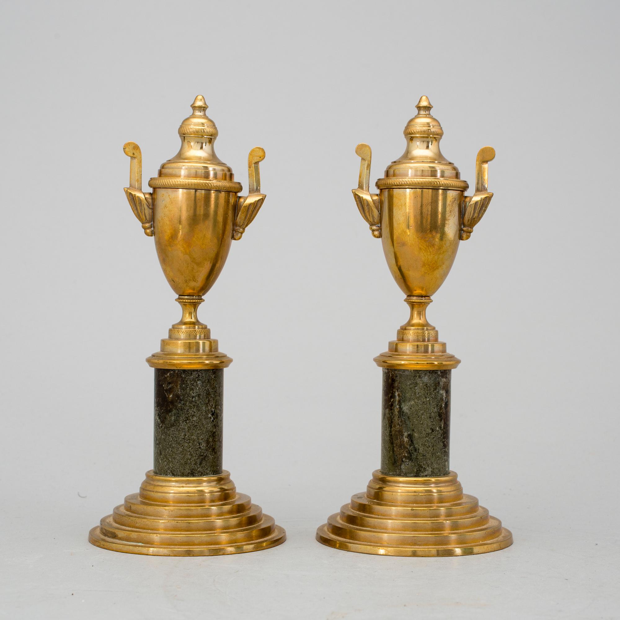 A pair of brass cassolettes No 110 Skultuna early 20th century.