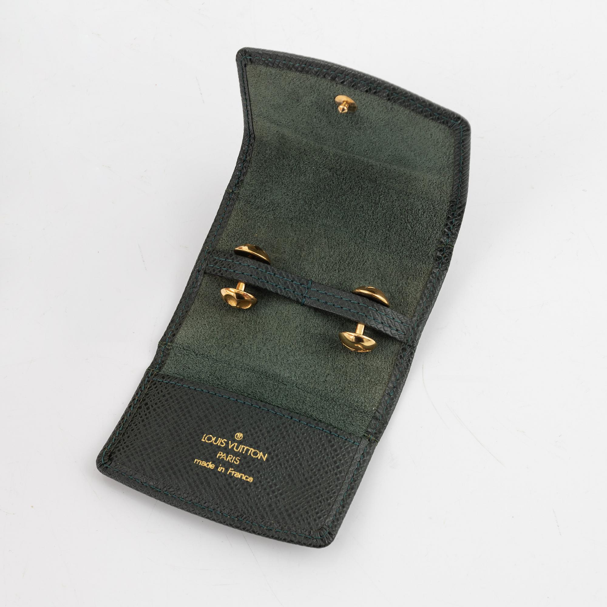 Louis Vuitton, a pair of cufflinks in a taiga case.