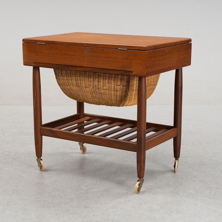 A teak veneered sewing table, 1950's/1960's.