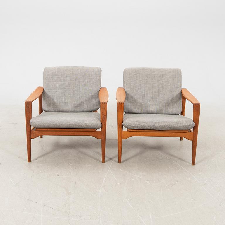 A pair of teak easy chairs, Denmark middle fo the 20th century.