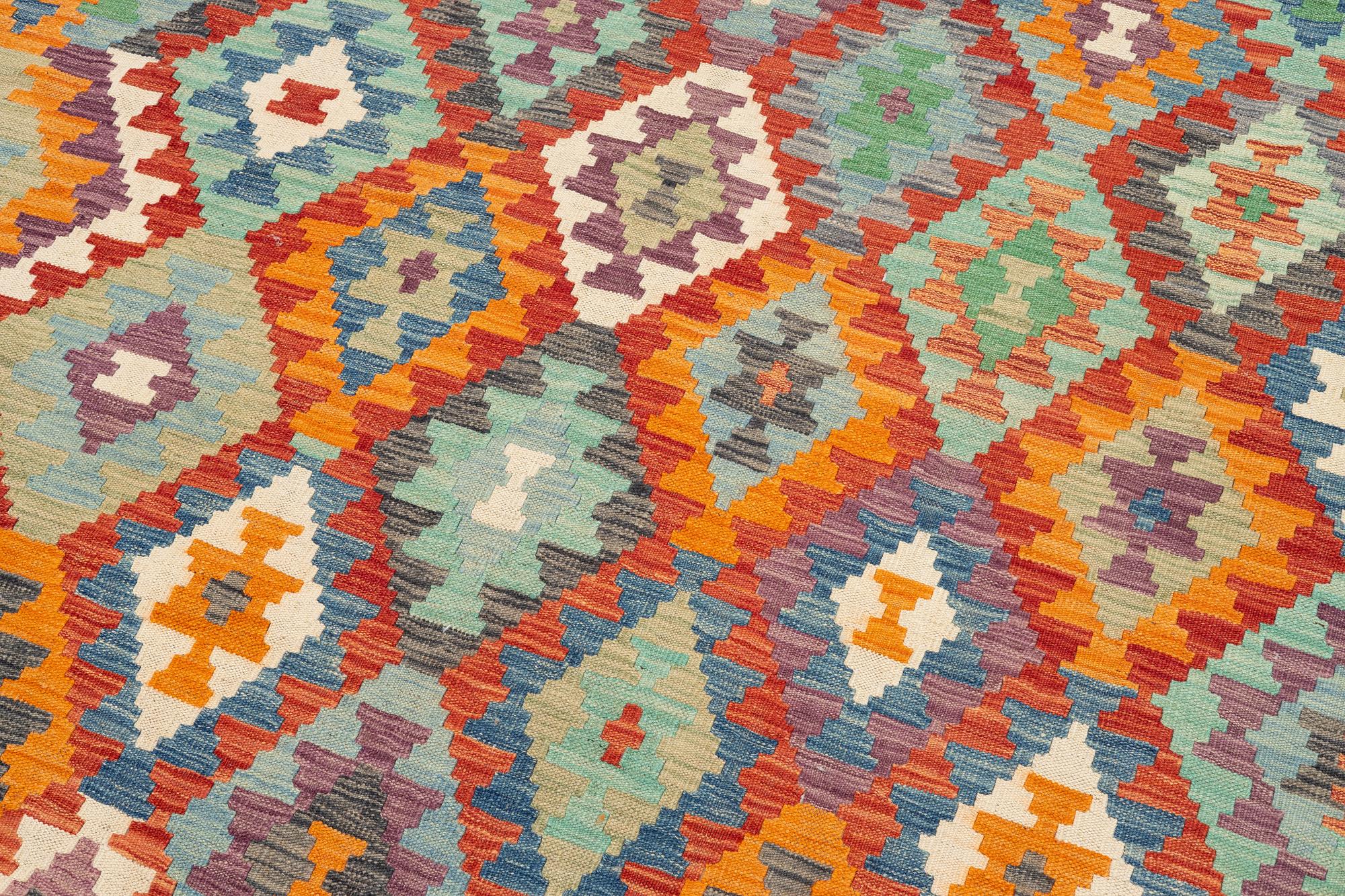 A kilim carpet, c. 295 x 203.
