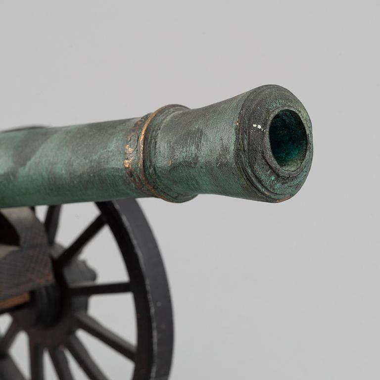 A copy of a field canon with monogram of king  Karl XII produced by Svensk Metallkonst, Carlscrona in late 20th century.