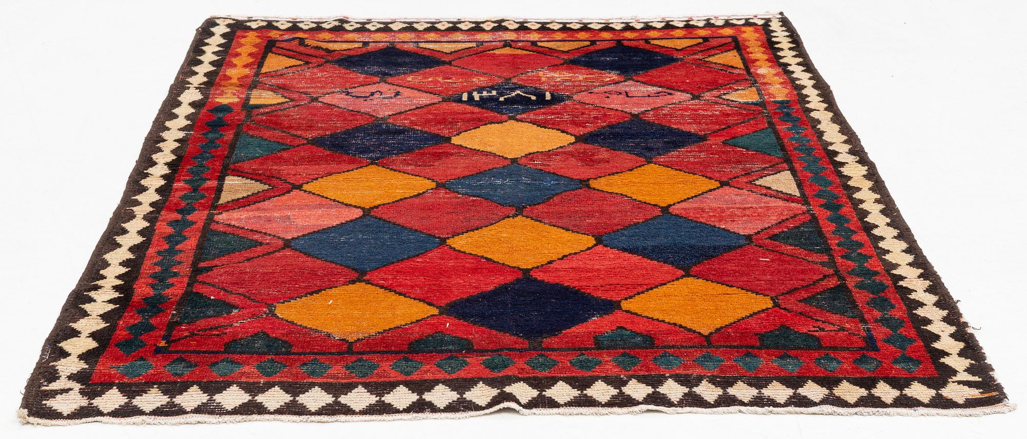 A semi antique Khersake-Bakhtiarirug, c. 211 x 162 cm.