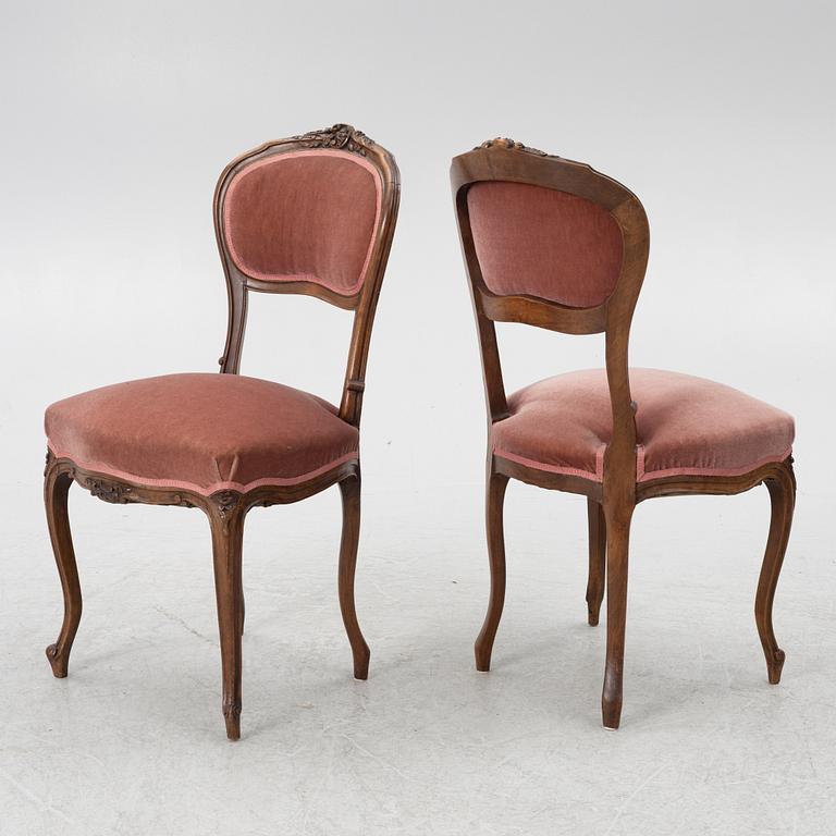 Sofa, 2 armchairs, 4 chairs, table and banquet, Rococo style, 20th century.