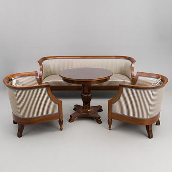 A mid-late 19th Century four-piece sofa suite.
