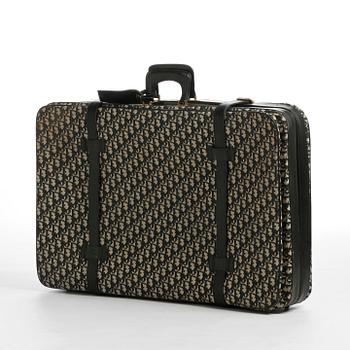 CHRISTIAN DIOR, a monogram canvas suitcase.