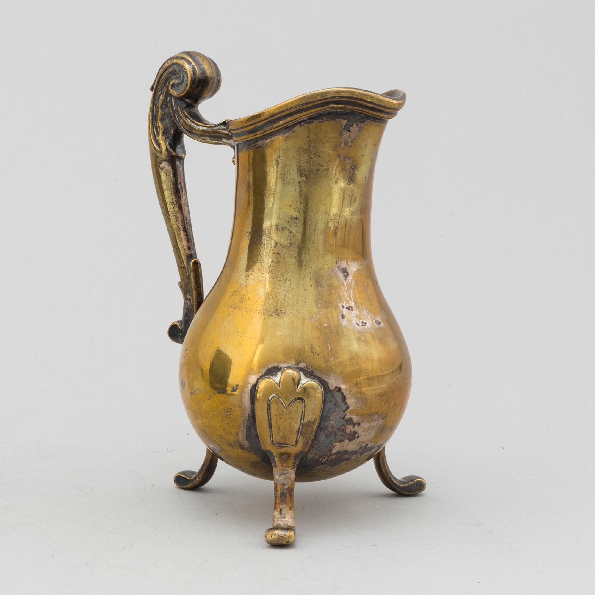 An 18th century bronze jug.