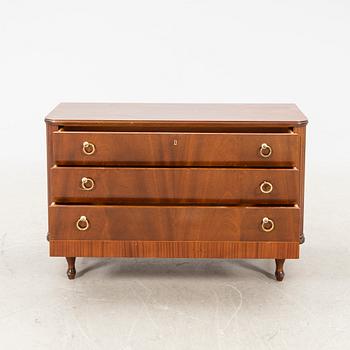 A 1940s mahogany dresser.