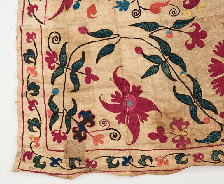 An embroidery, an antique suzani, Ura Tube or the Ferghana valley, ca 250,5-253,5 x 185,5-191,5 cm.