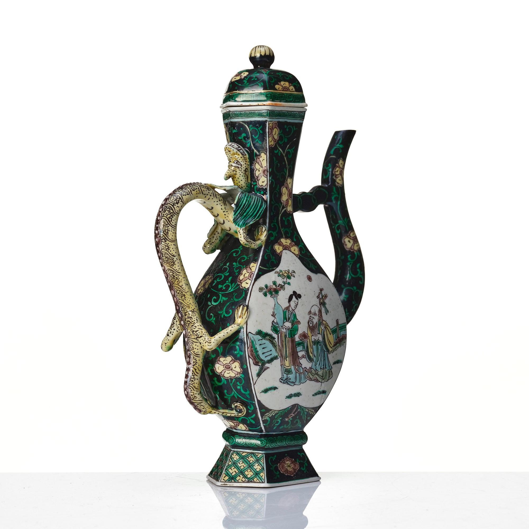 A famille noire ewer with cover, Qing dynasty, 19th Century with Kangxi six character mark.