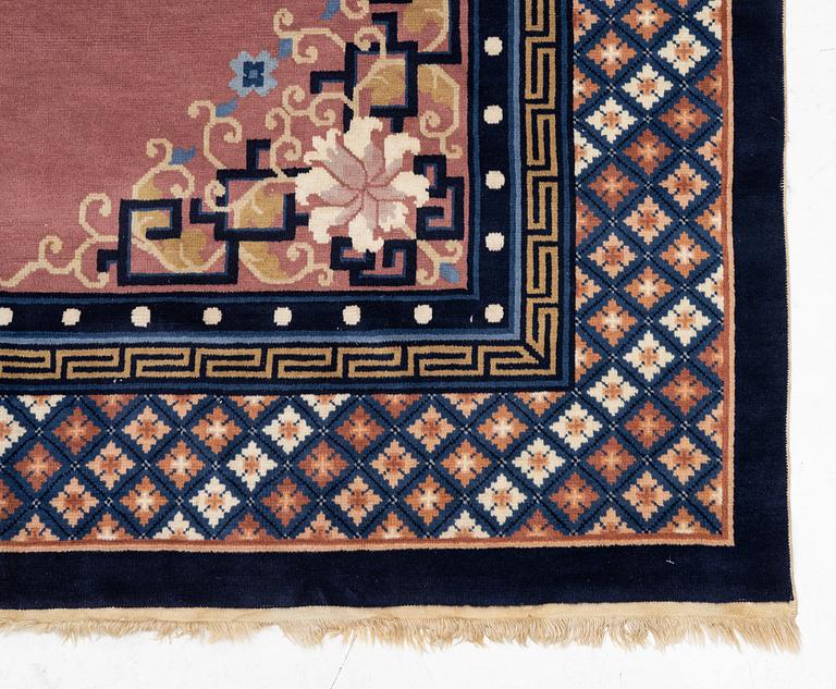 A semi-antique Chinese carpet, c. 305 x 210 cm.