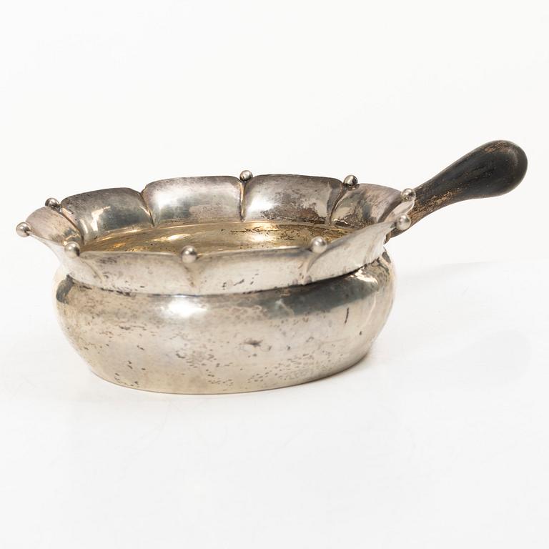 Sauceboat, silver, Oscar Sjögren, Gothenburg 1920, and spoon, silver, David Andersen, Norway early 20th century.