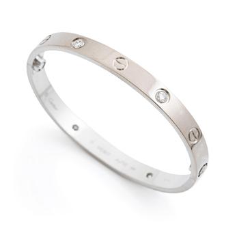 495A. Cartier armband "Love" 18K vitguld med fyra runda briljantslipade diamanter.
