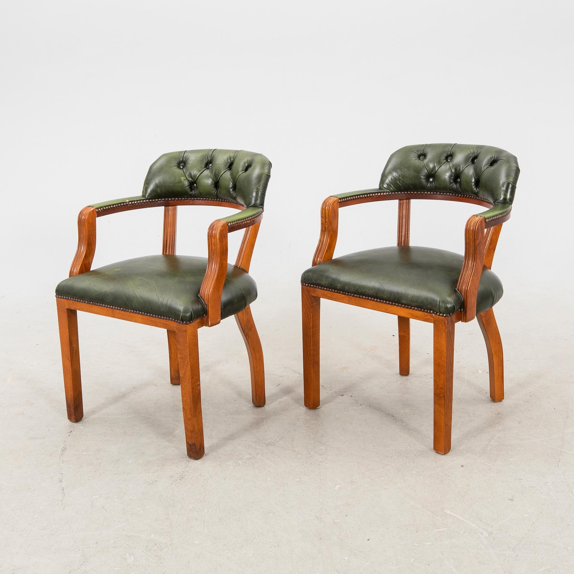 A pair of leather armchairs from the second half of the 20th century.