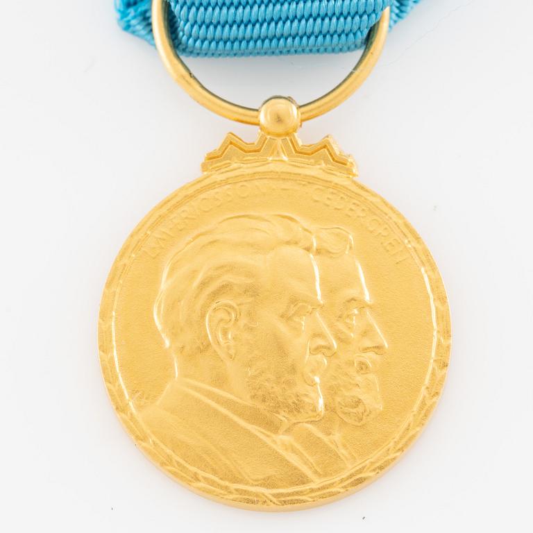 Medal, 14k gold, LM Ericsson, for merit and skill.