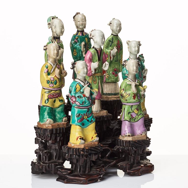 A group of eight immortals on  wooden stand, Qing dynasty, 19th Century.