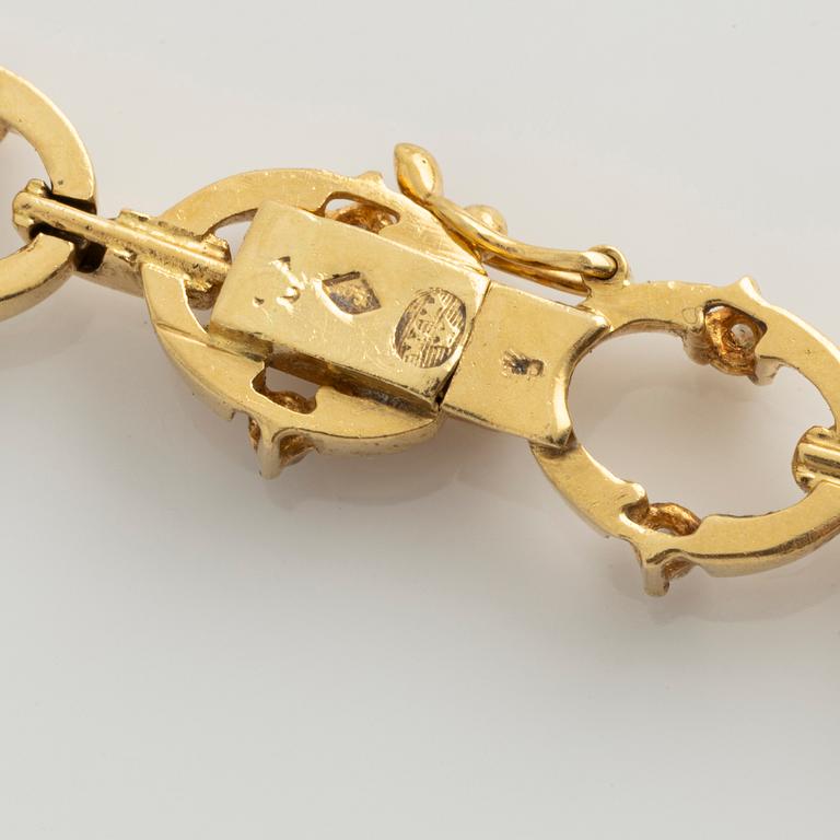 Collier 18K guld med runda briljantslipade diamanter.