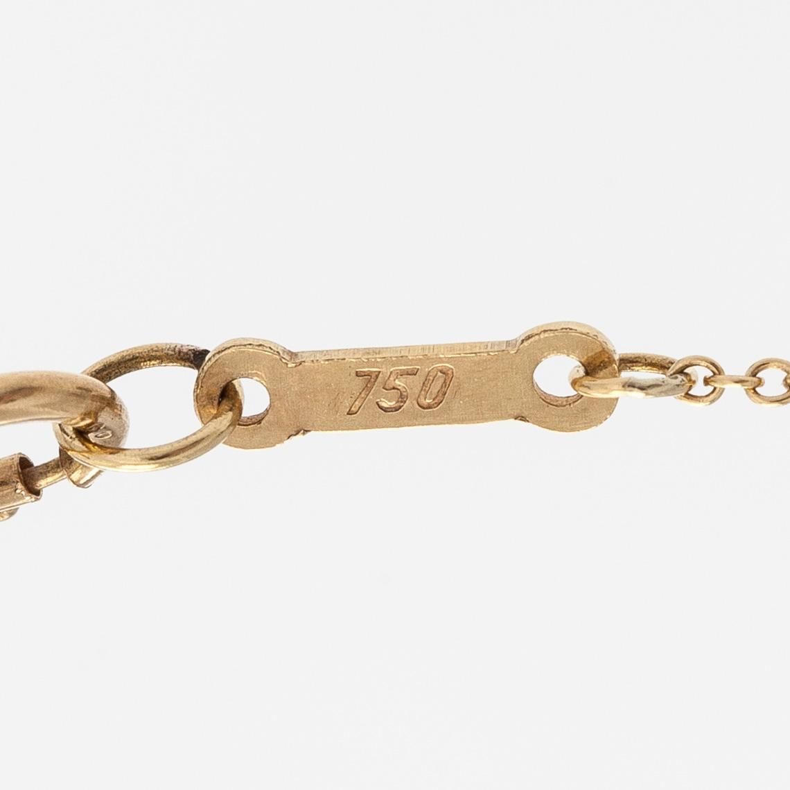 Tiffany, Elsa Peretti, an 18K gold 'Starfish' necklace.