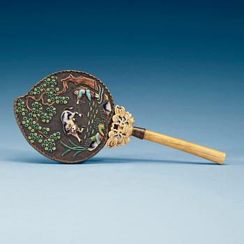 1797. A Chinese enamel and ivory hand mirror, early 20th Centruy.
