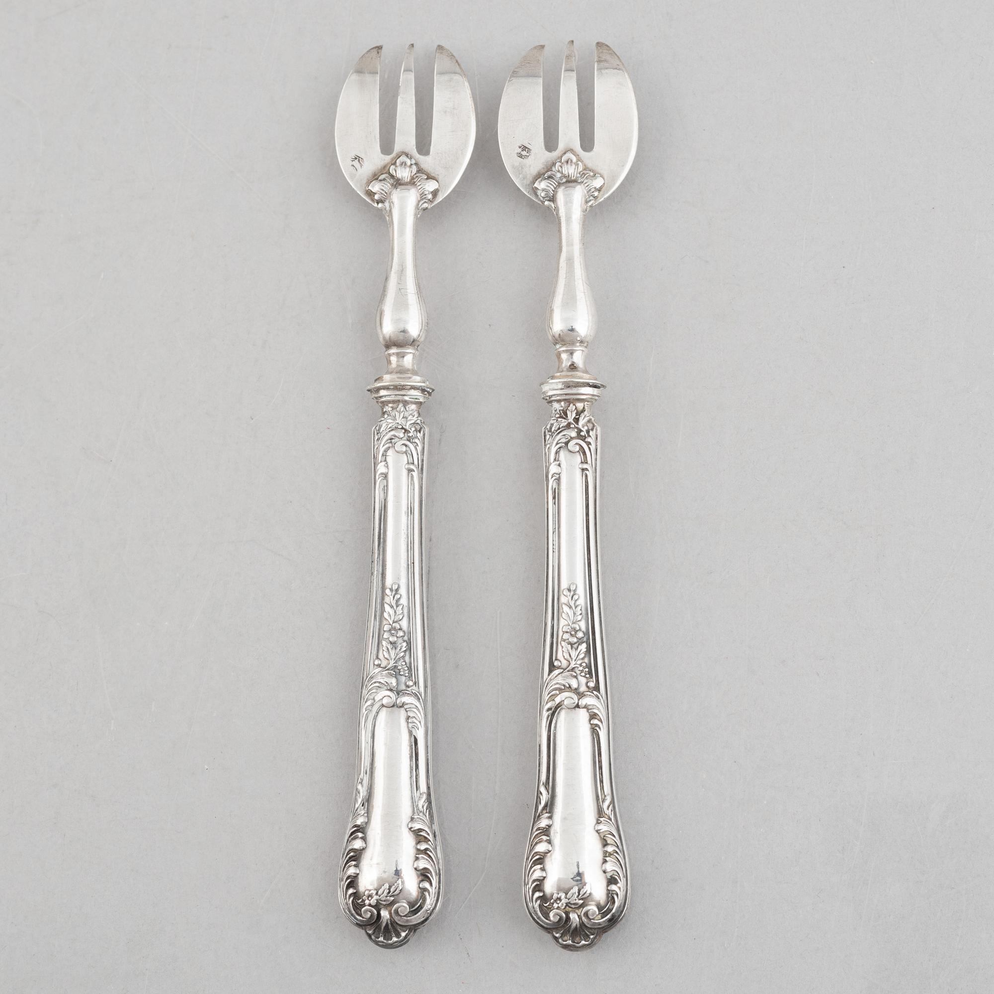 A set of twelve French silver oyster forks, mark of Louis Coignet