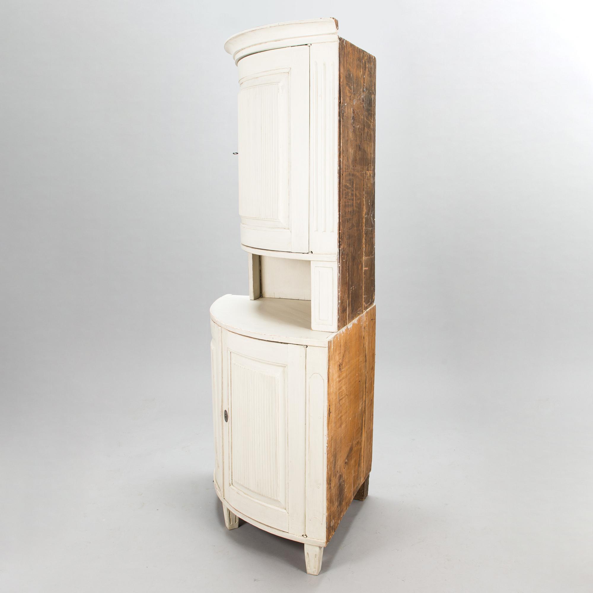 A Gustavian corner cabinet, late 18th century.