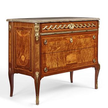 A Gustavian marquetry, ormolu-mounted and limestone-top commode by Georg Haupt (master in Stockholm 1770-84).