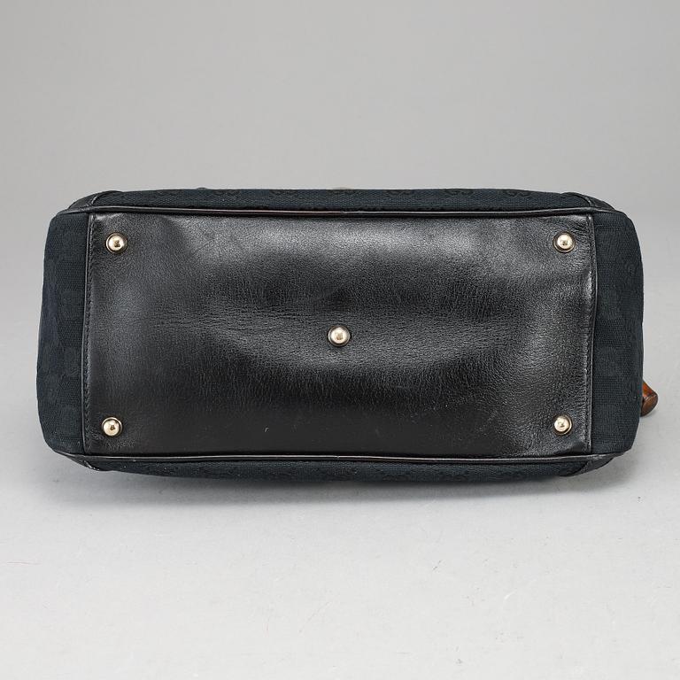 GUCCI, 'GG Canvas Horsebit Wave Handbag'.