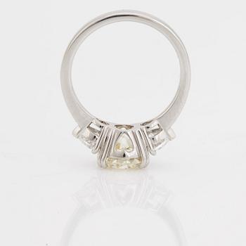 A brilliant- and heart cut diamond ring.