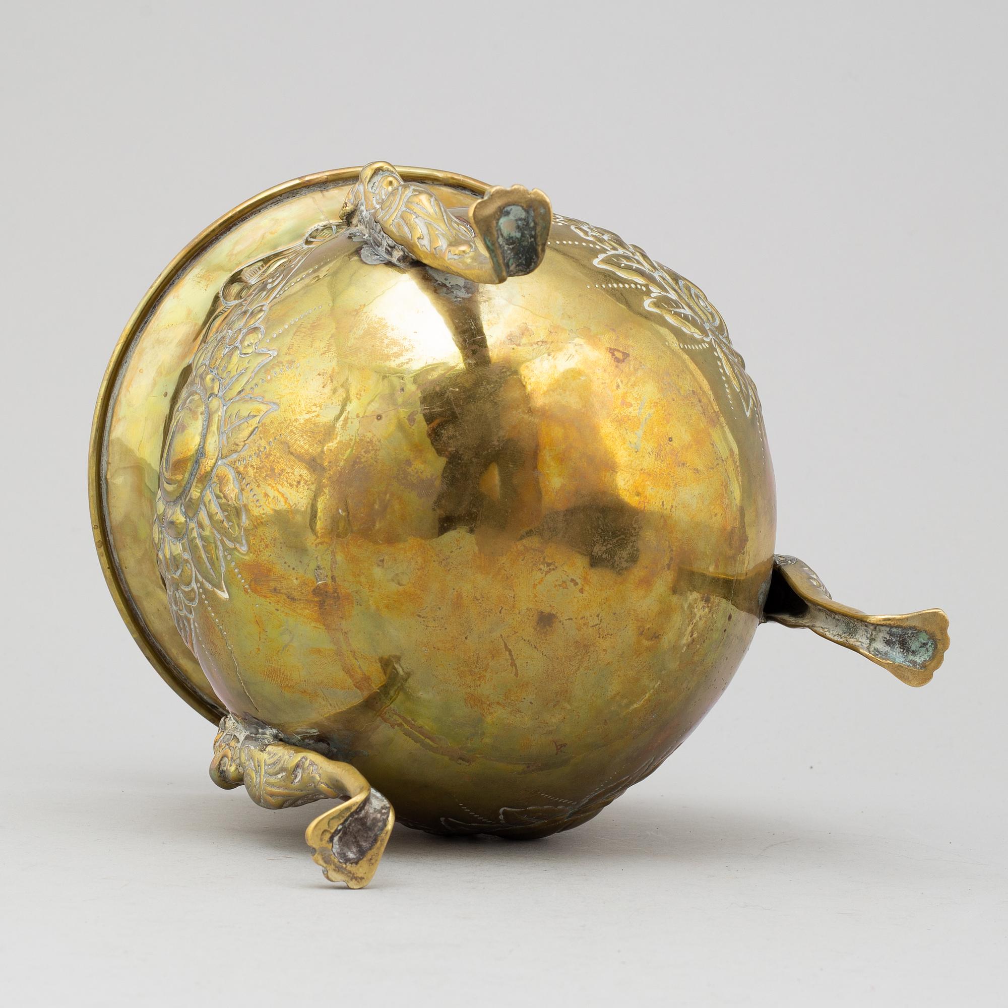 An 18th century brass flower pot.