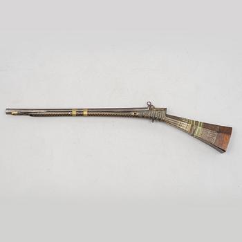 A Persian snaphaunce rifle, 18th century.