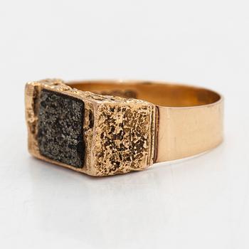 Björn Weckström, A 14K gold and copper ore ring 'Gold stone' for Lapponia 1971.