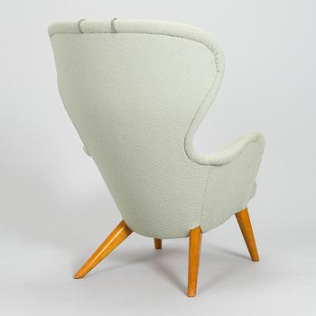 Carl Gustaf Hiort af Ornäs, A mid-20th-century armchair 'Siesta' manufacturer Puunveisto Oy - Träsnideri Ab, Finland.