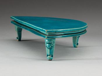 A turquoise glazed half moon shaped stand, Qing dynasty, Kangxi (1662-1722).