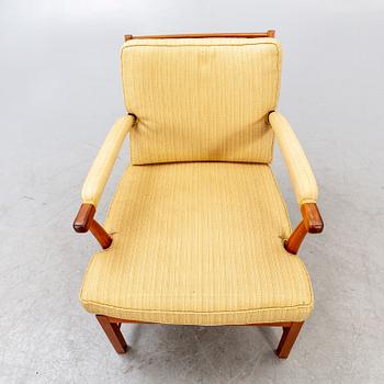 A Josef Frank walnut armchair Firma Svenskt Tenn model nr 667.