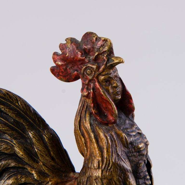 A MINIATURE SCULPTURE, painted bronze, early 20th century.