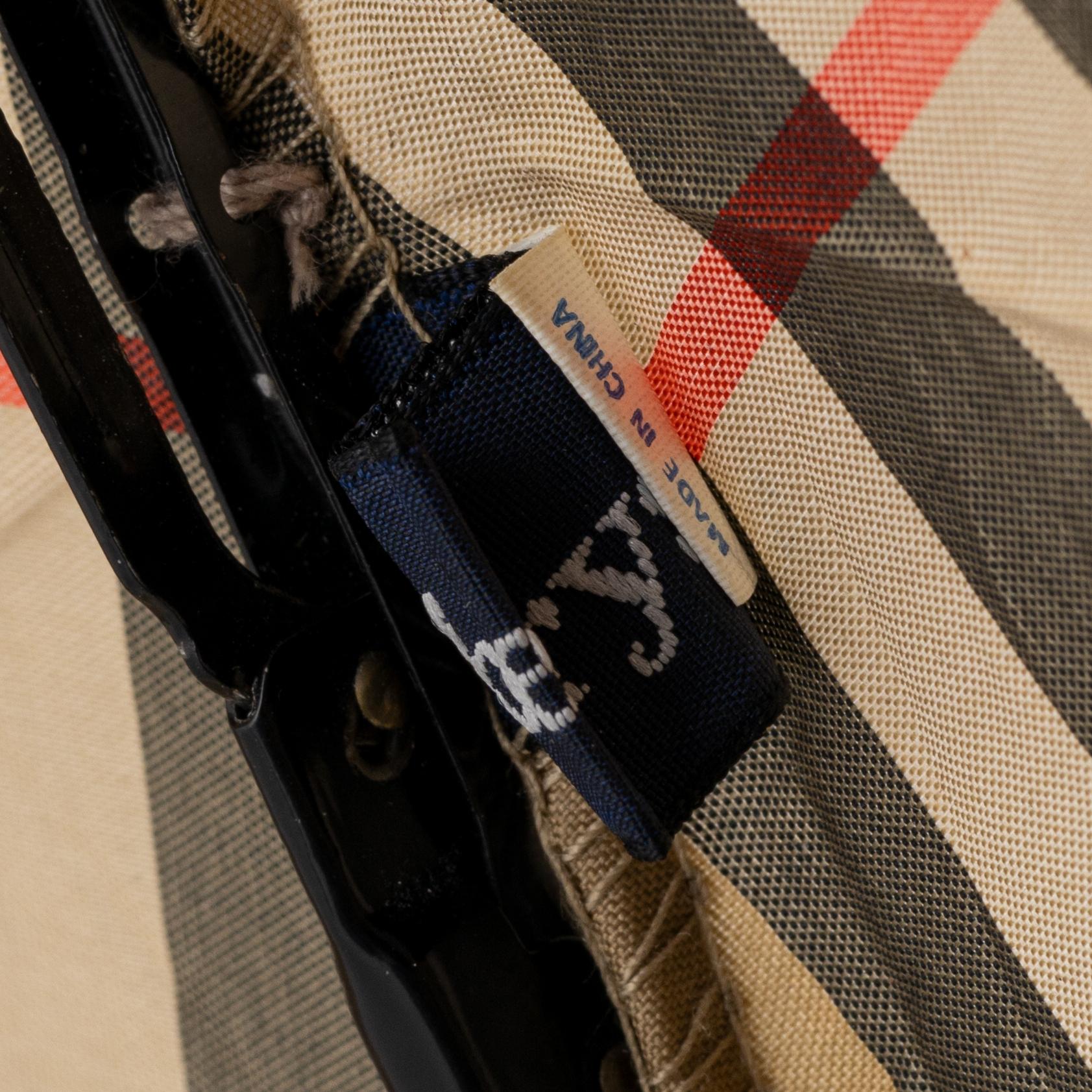 Burberry, an umbrella.